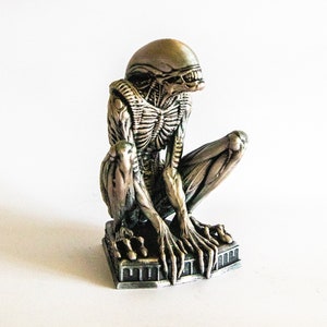 Aliens Movie inspired Sitting Alien Toy - Cute and Adorable Extraterrestrial Collectible