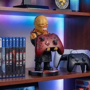 May include: A set of three ceramic mugs with a speckled, matte finish. The mugs are in shades of cream, light gray, and dark gray. Each mug has a simple, minimalist design, perfect for coffee or tea.