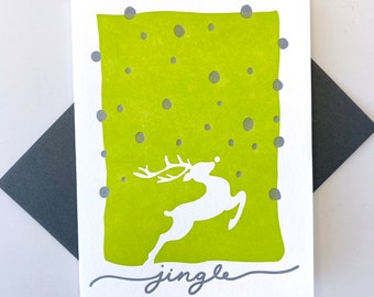 Holiday Letterpress Greeting Card for Christmas or New Year Featuring a Flying Reindeer Sending a "Jingle"