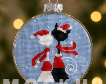 Gatti innamorati a Natale con sciarpe e cappelli natalizi - schema punto croce PDF