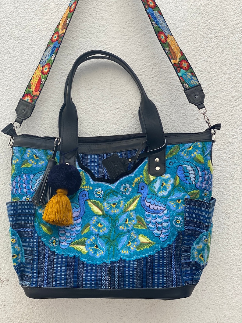 huipil on both sides Sale save 25 dollars !Convertible bag turns into backpack Sits on its own