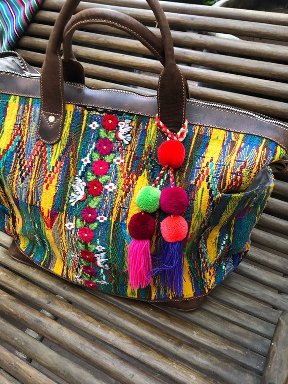 huipil on both sides Sale save 25 dollars !Convertible bag turns into backpack Sits on its own