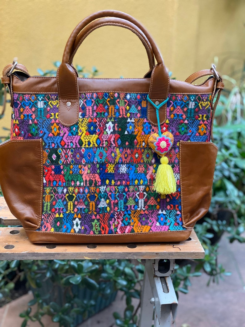 leather and Huipil from Tactic . 25 percent off !has been discounted from Beautiful weekender bag handmade