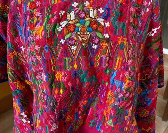 huipil from Tactic  purple hand weaved fabric , and beautiful orange red turquoise awesome ! blouse short in the style of Coban