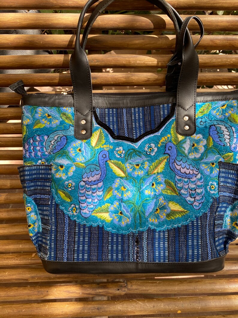 huipil on both sides Sale save 25 dollars !Convertible bag turns into backpack Sits on its own