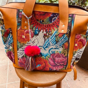 huipil on both sides Sale save 25 dollars !Convertible bag turns into backpack Sits on its own