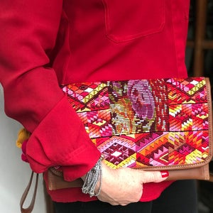 Wristlet, clutch , natural leather and traditional Huipil from Chichicastenango in beautiful reds , pretty accent piece