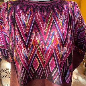 Boho -Vintage huipil from Chichi in  rich berries (burgundy , fucsia , turquesa ) hand weaved on a backstrap loom. Outstanding