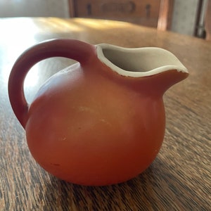 Vintage Orange Tilted Ball Pitcher 1950