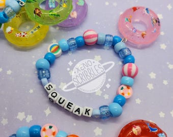 Flotteur de piscine Pooltoy Anneau de natation Intertube gonflable « Squeak » Bracelets Kandi colorés