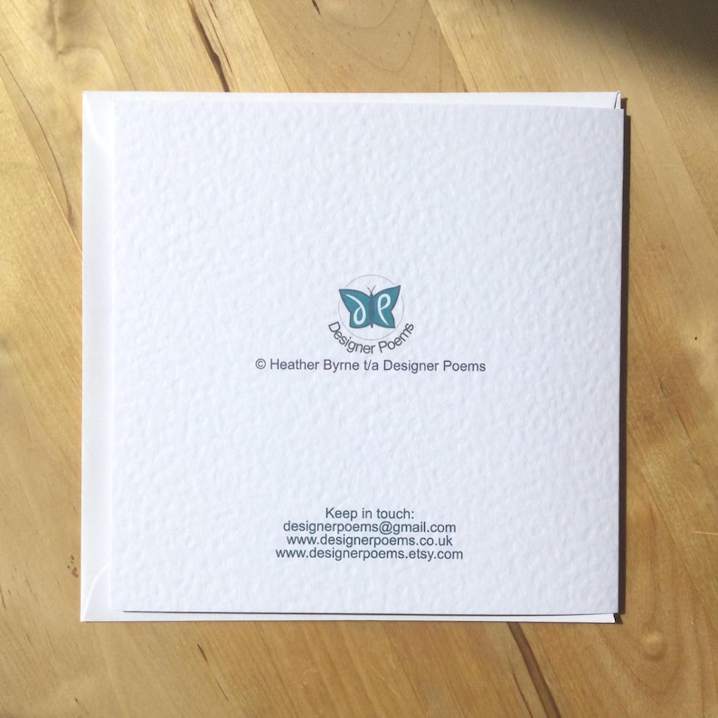 May include: A set of three ceramic mugs with a speckled, matte finish. The mugs are in shades of cream, light gray, and dark gray. Each mug has a simple, minimalist design and a rounded handle.