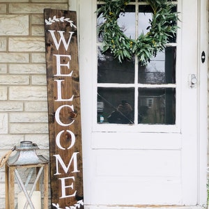 Brown front porch welcome sign