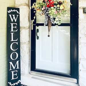 Black welcome sign for front door
