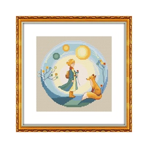 May include: A cross-stitch embroidery of The Little Prince standing with a fox in a blue and yellow starry sky. The prince is wearing a blue coat and holding a flower. The fox is orange and has a white tail.