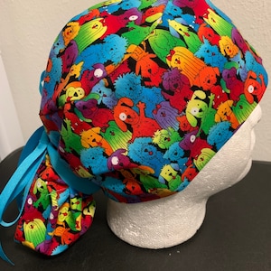 Women’s rainbow dogs ponytail OR scrub cap