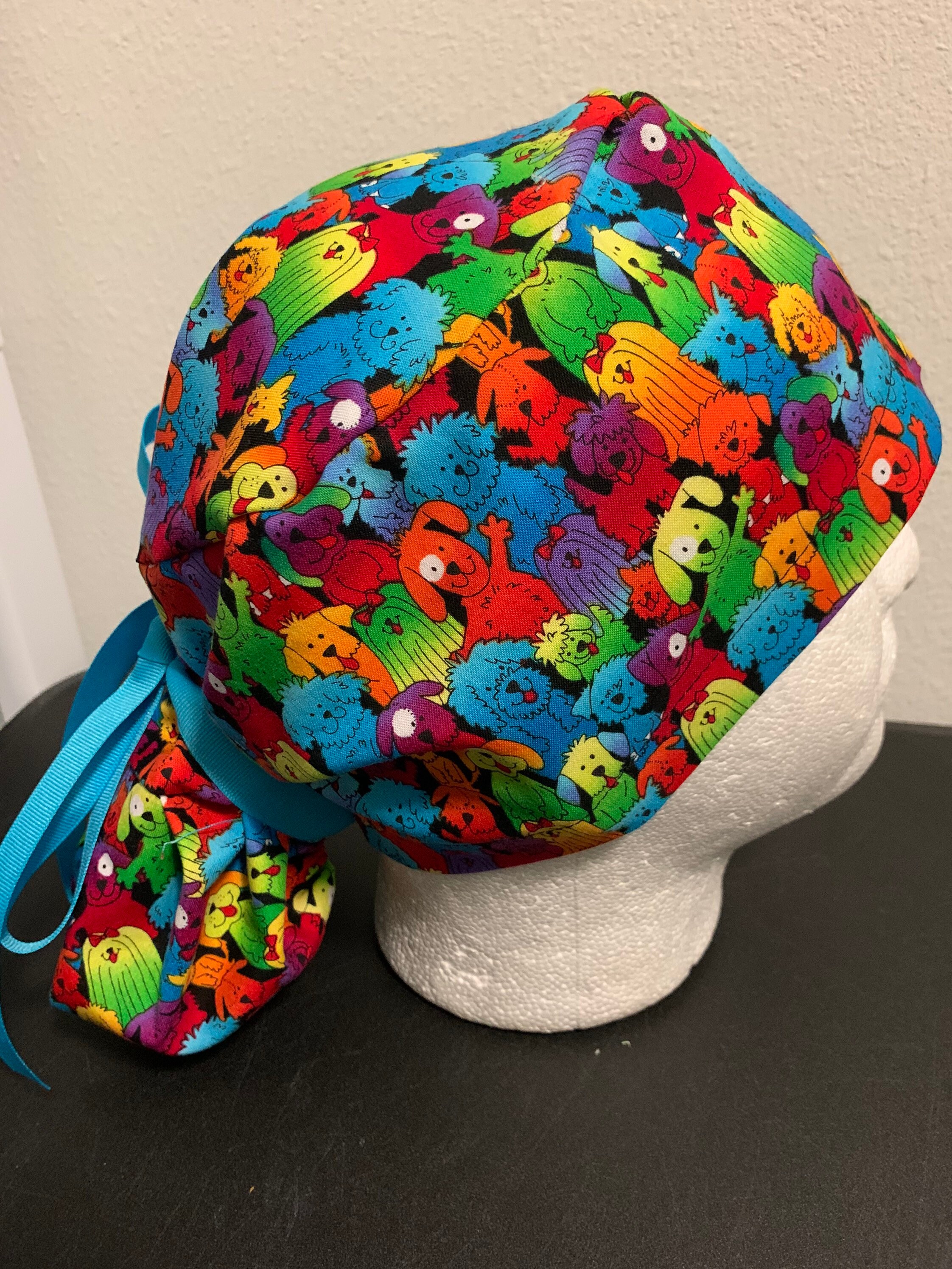 Women’s rainbow dogs ponytail OR scrub cap