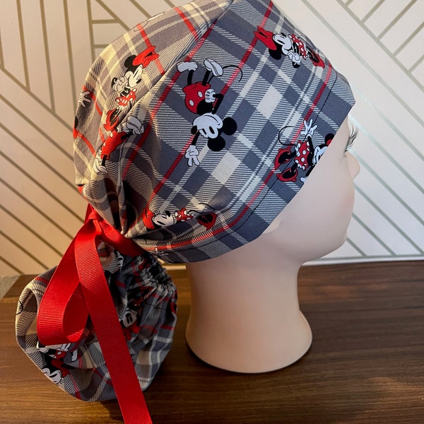 Women’s plaid Mickey and Minnie European or Ponytail OR scrub cap. Button add on available