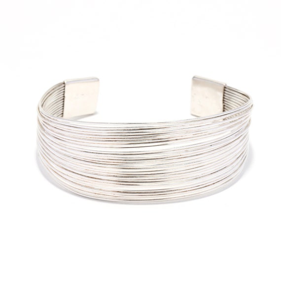 Wire outlet cuff bracelet