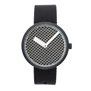 Original minimalist designer white and black creative watch with moire graphic patterns that change with time