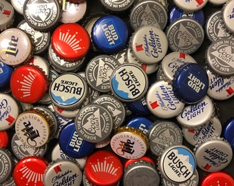 100 BEER.COM BEER BOTTLE CAPS BRIGHT BLUE NO DENTS RARE THE PARTY STARTS HERE