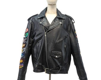May include: Black leather motorcycle jacket with colorful patches on the sleeves.