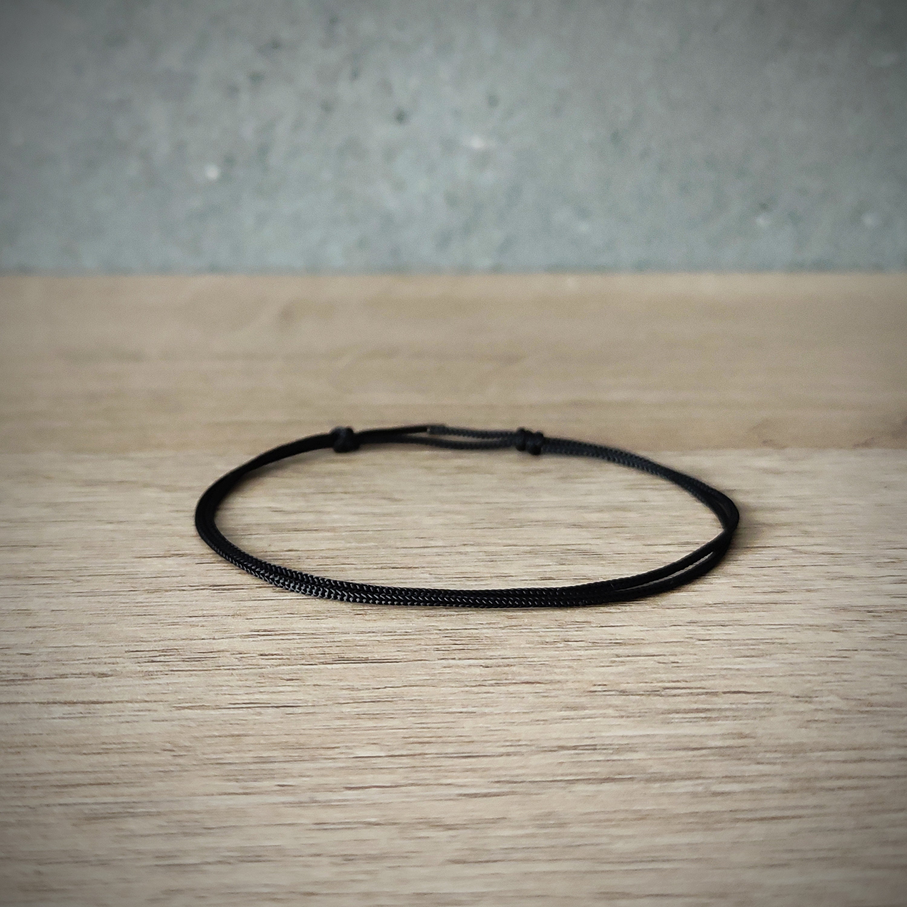 Bracelet cordon imperméable à l'eau fine NOIR Bijou porte-bonheur Homme Femme Rock minimaliste bouddhiste