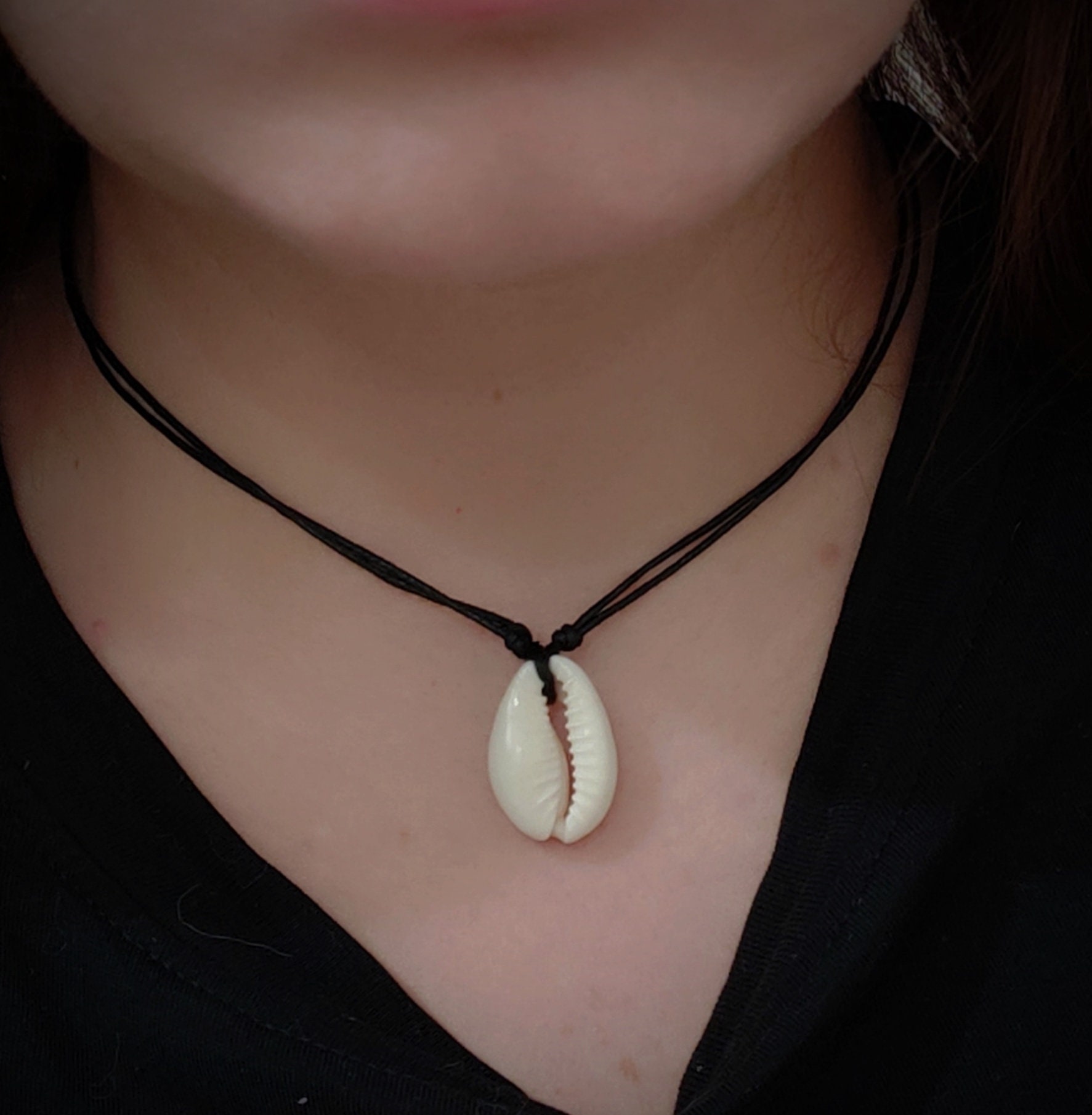 Cowrie shell necklace on stand best sale