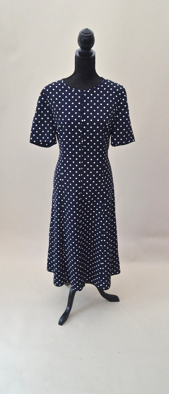 navy and white polka dot dress
