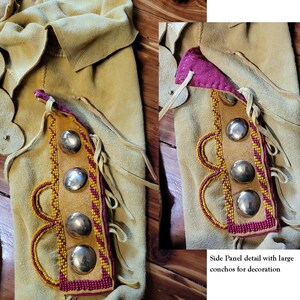 May include: Close-up of a tan leather garment with a side panel detail. The panel is decorated with red and yellow beadwork and silver conchos. "Side Panel detail with large conchos for decoration" is written below the panel.
