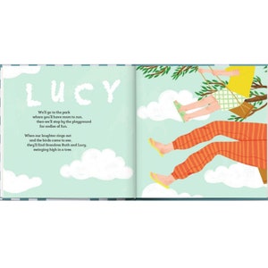 May include: An illustration of a girl swinging on a rope swing in a tree. The girl is wearing orange and white striped pants, a yellow shirt, and sandals. The text "LUCY" is written in large, colorful letters on the page.