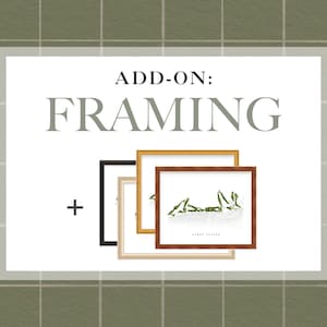 May include: Add-on: Framing. A white background with the text "ADD-ON: FRAMING" in black. A plus sign is below the text. Three different frames are shown, one black, one gold, and one brown. The frames are layered on top of each other, with the black frame on the bottom, the gold frame in the middle, and the brown frame on top.