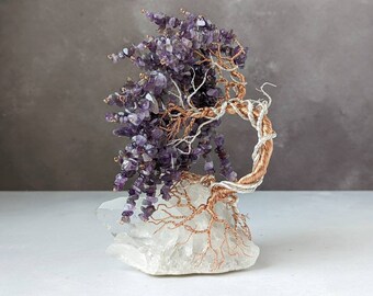 Copper and silver plated copper wire tree on a quartz base with amethyst leaves