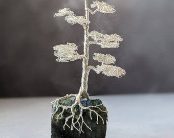 Silver plated copper wire tree on a labradorite base with a polished front