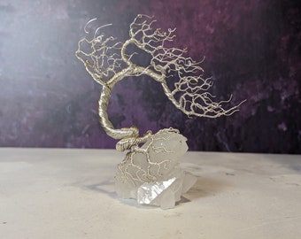 Quartz with a silver plated copper wire tree