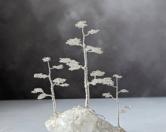Quartz with a silver plated copper wire tree forest sculpture