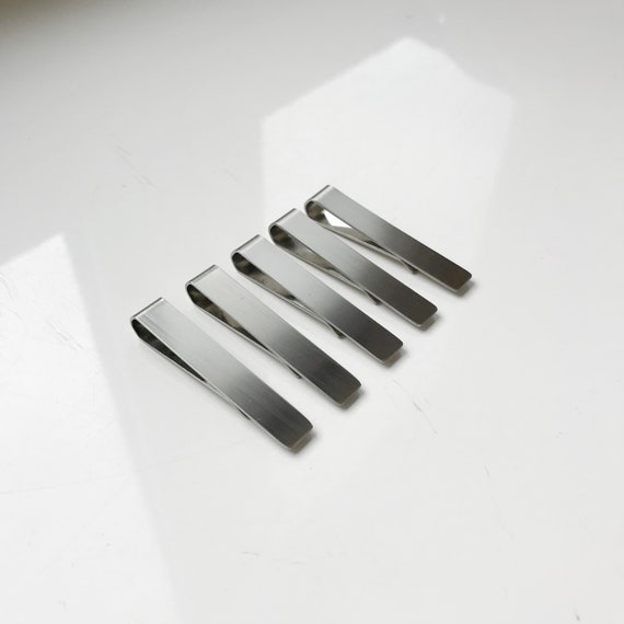large silver binder clips