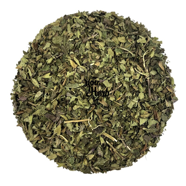 May include: Dried green mint leaves, a popular ingredient for teas and cooking.