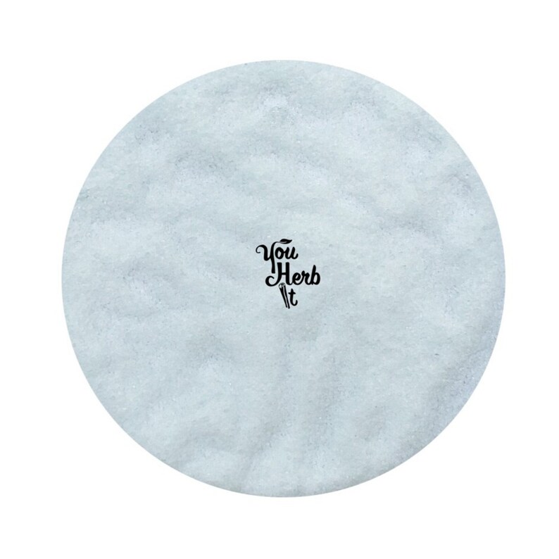 May include: A light blue round disc with the text "You Herb It" in black lettering.