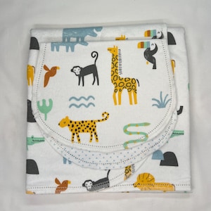 Lion, giraffe, monkey, zebra & elephant hemstitch flannel baby blanket and burp cloth, double sided size 36x40. Perfect swaddle. Kits avail