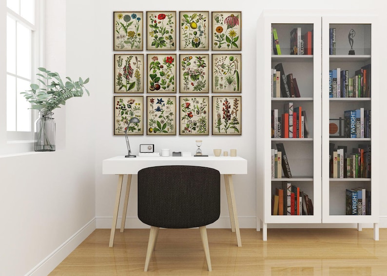 May include: A home office featuring a white desk, a black chair, and a white bookshelf. Twelve framed botanical prints are displayed on the wall above the desk. A glass vase with greenery sits on the windowsill.