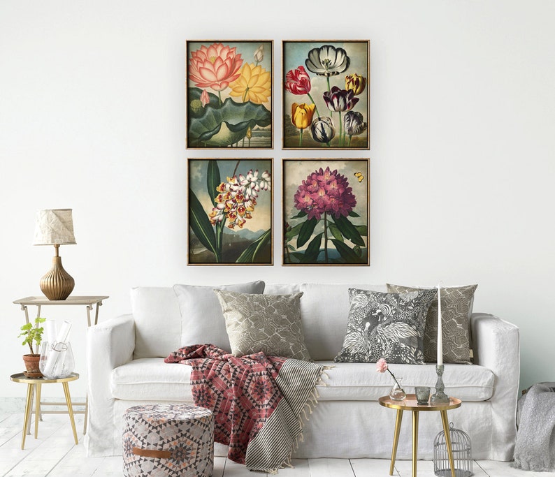May include: Set of four framed botanical prints featuring colorful flowers and plants. The prints are in a vintage style and have a white background. The frames are brown wood.