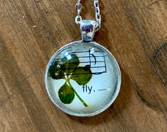 Genuine four-leaf clover necklace (“fly” from Beatles’ “Blackbird” sheet music)