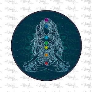 May include: A circular teal graphic featuring a meditating figure with seven chakra symbols in various colors. The figure is in a lotus position, with long flowing hair. The background has a mandala design and the text "my Vinyl cut" is repeated.