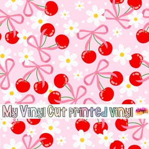 May include: A pink background with a repeating pattern of red cherries with pink bows and white daisies. The text "My Vinyl Cut Printed Vinyl" is at the bottom of the image.