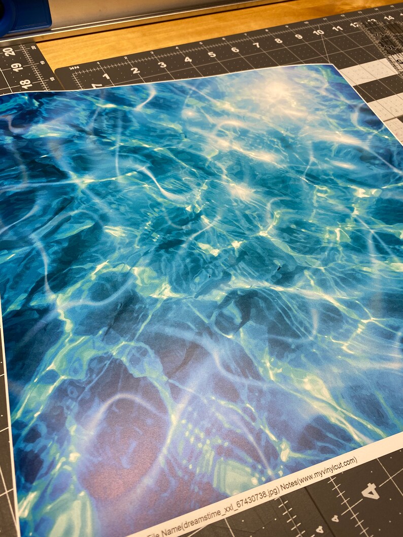 May include: Abstract blue and green water ripple pattern with a white, light blue, and green gradient. The pattern is reminiscent of the surface of a pool or ocean.