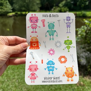 May include: A sticker sheet with colorful robot illustrations and tools. The sheet says "Nuts & Bolts" and "Sticker Sheet www.myvinylcut.com".