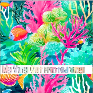 May include: A colorful digital illustration of coral reefs and fish. The coral is pink, green, and blue. The fish are orange and blue. The background is a teal blue.