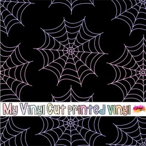 May include: Black vinyl sheet with a repeating pattern of light pink spiderwebs. The text "My Vinyl Cut printed Vinyl" is displayed in a colorful font across the bottom of the image. This material is suitable for crafting and DIY projects.