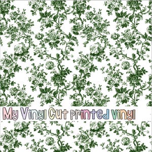 May include: White vinyl with a repeating pattern of dark green floral vines and blossoms. The text "My Vinyl Cut Printed Vinyl" is displayed in a colorful, playful font across the bottom of the image.