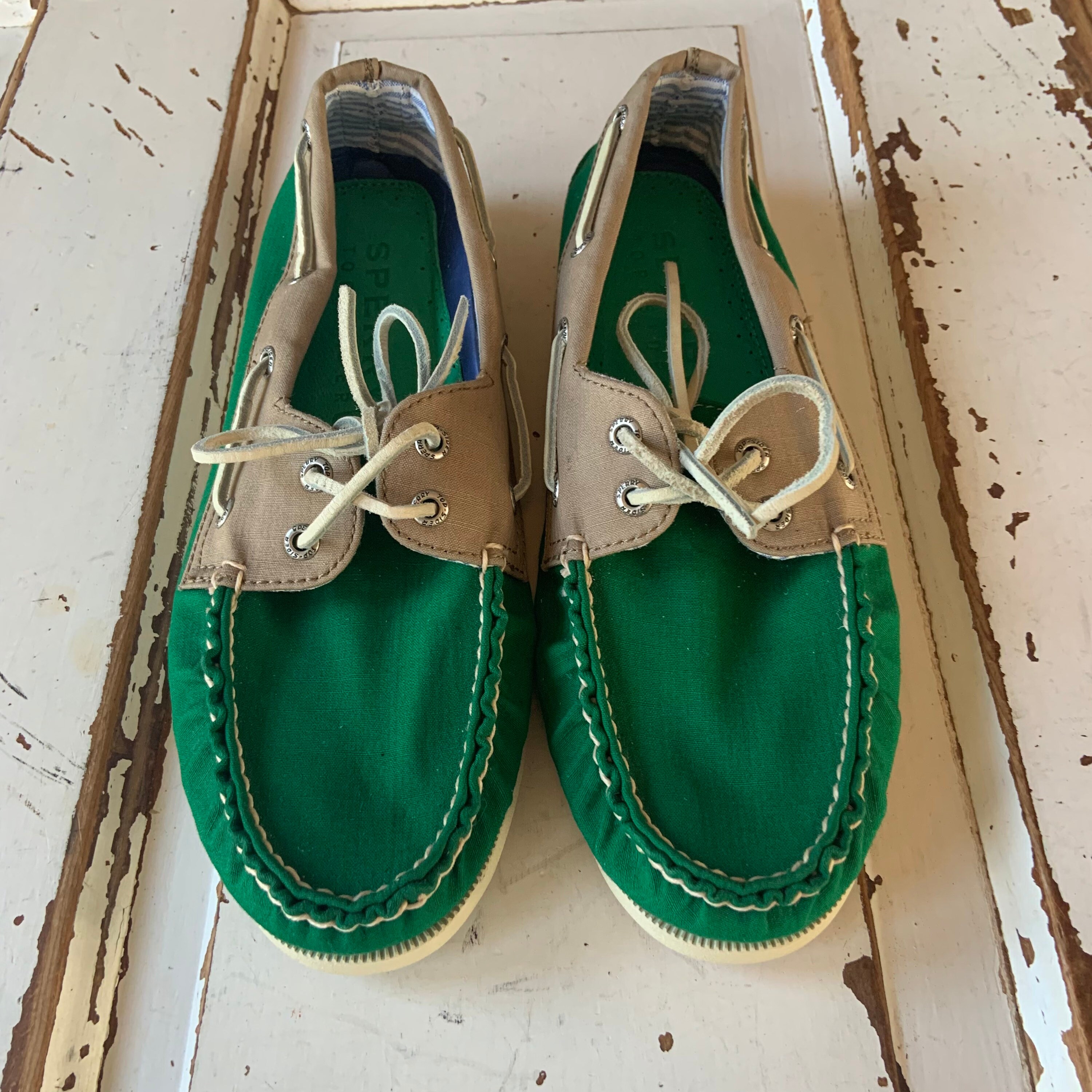 Pink and store green sperrys